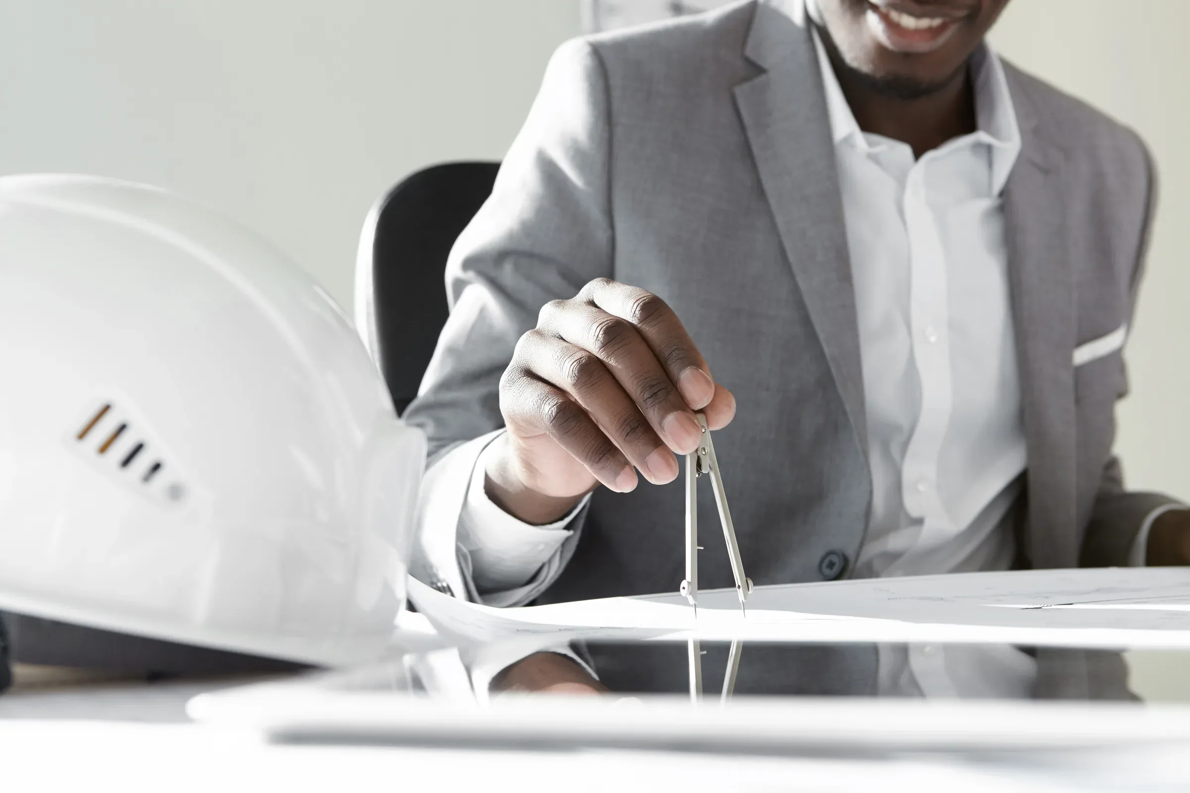 Contractor reviewing technical drawings